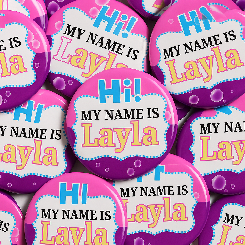 Name tags with 'My Name is Layla' text on a colorful background